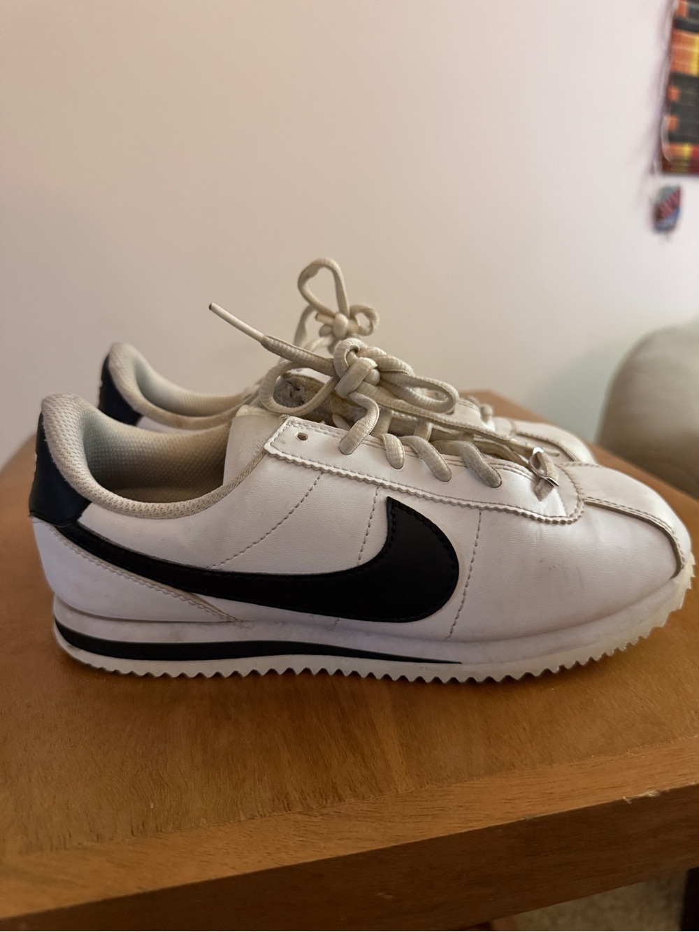 Nike Kids White Sneakers with Black Swoosh